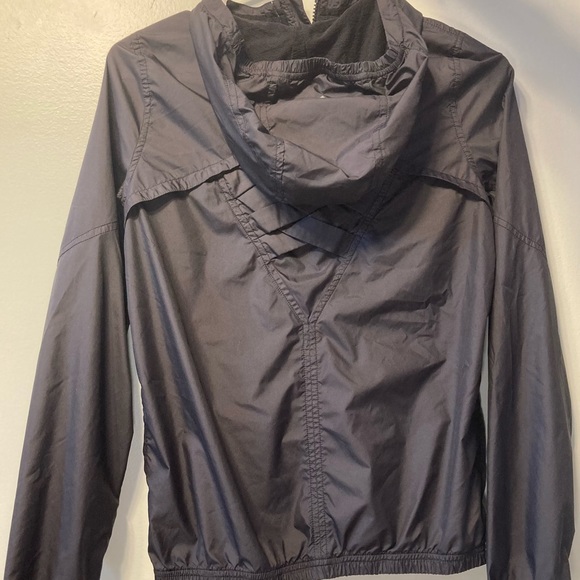 Ivivva, black zip up wind breaker. - Picture 2 of 4